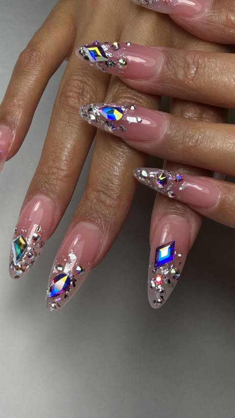 Instagram post by @djm.nails for Bluestreak Crystals. Caption reads: [...] beautiful client 💎✨ . Bling from....