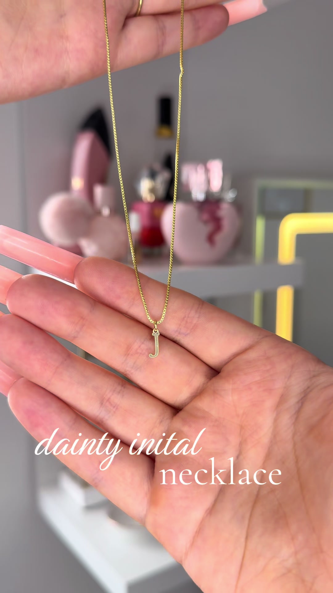 TikTok post by @emmapaislei for VENOCO. Caption reads: soo cute! ✨ i love dainty jewelry @VENOCO....