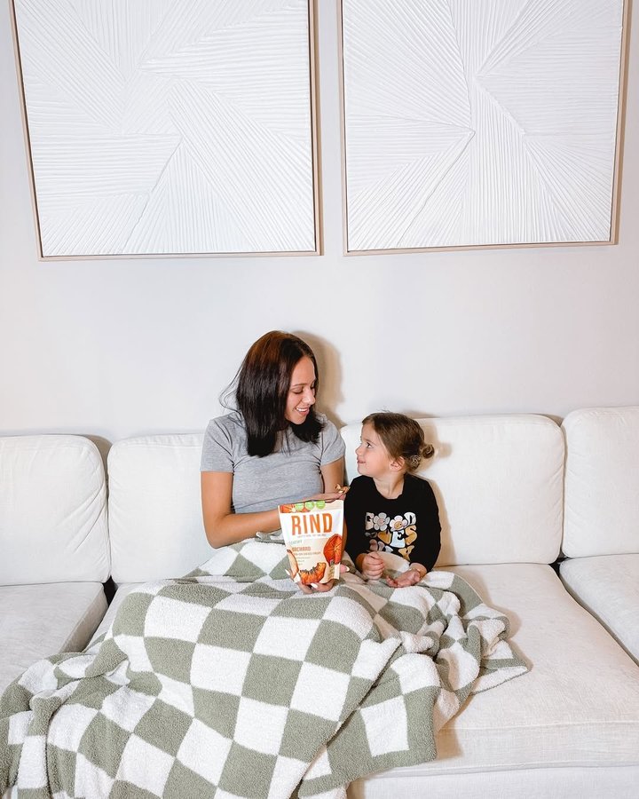 Instagram post by @lifewiththe_fellers for RIND Snacks. Caption reads: #rindpartner The holiday season is officially here....