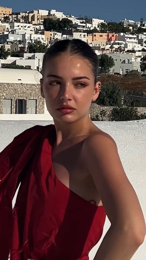 Instagram post by @swamicaputo for YOOX. Caption reads: Santorini with @yoox #yoox #adv.