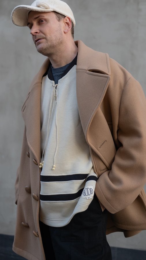 Instagram post by @raffaelpayr for JW ANDERSON. Caption reads: Jacket: @jw_anderson 
Top: @bode x @nike....