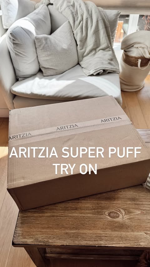 Instagram post by @haileyperry for Aritzia. Caption reads: @aritzia super puffs are back!! 🤭 Comment PUFF....