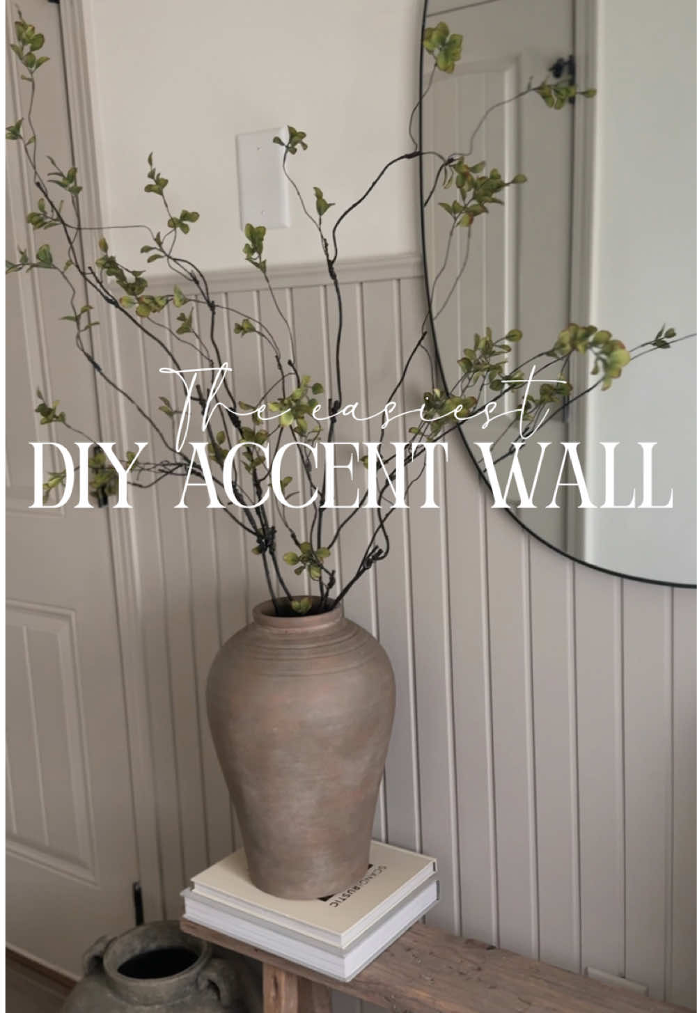 TikTok post by @creatively.crisp for Lowe's. Caption reads: This is the EASIEST accent wall I’ve ever done....