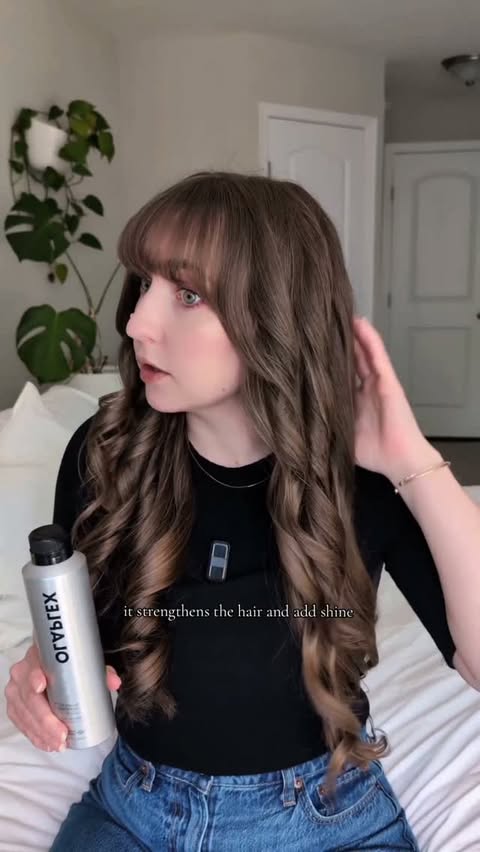 Instagram post by @_mo__styles_ for OLAPLEX. Caption reads: [...] for soft, brushable curls that last:....
