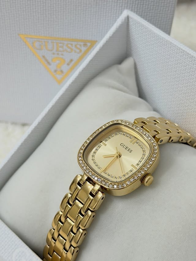 Instagram post by @mur.mur_style for GUESS Watches. Caption reads: [...] and grateful to collaborate with GUESS....