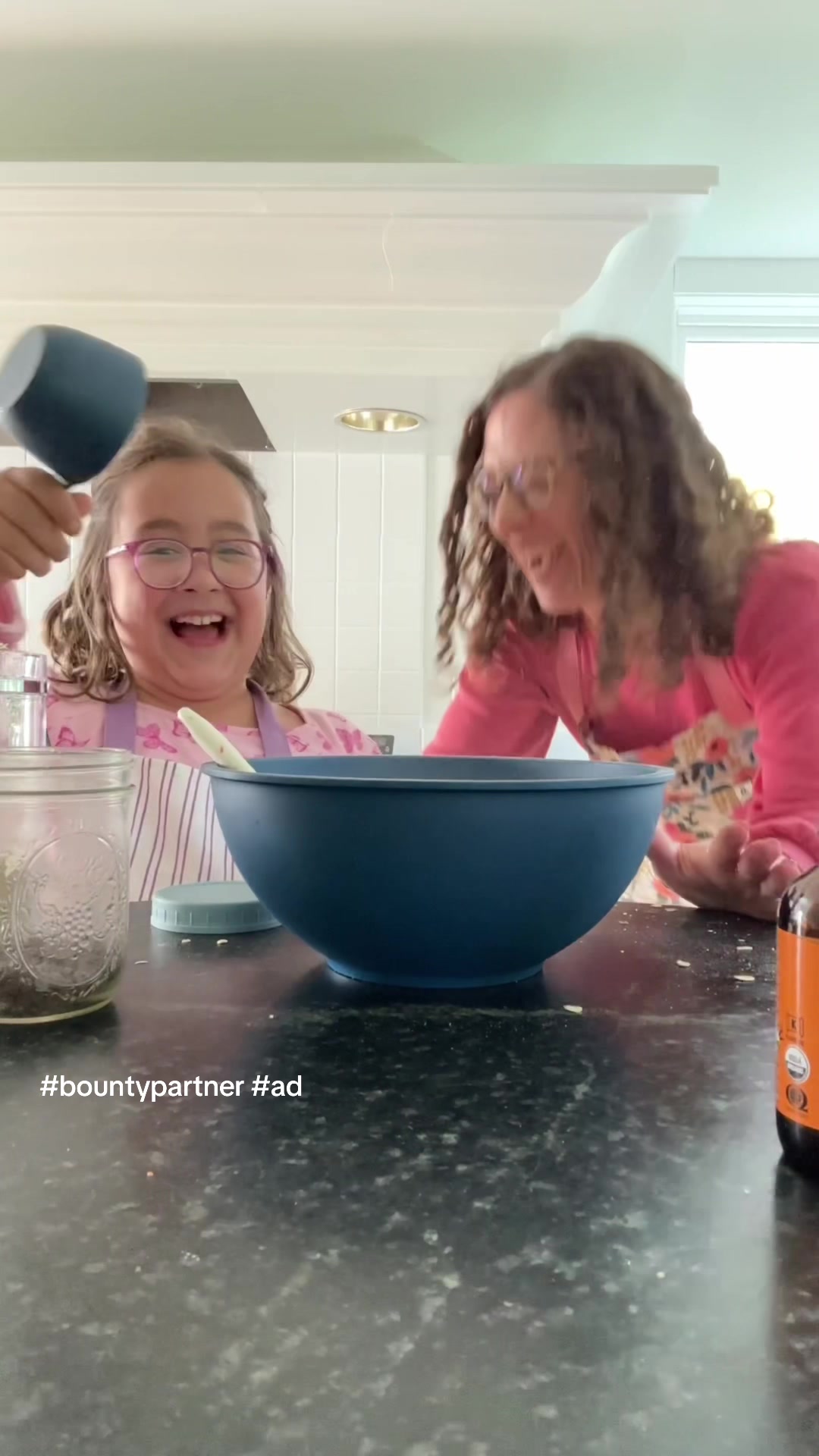 TikTok post by @yummytoddlerfood for Bounty. Caption reads: #ad #bountypartner Baking with kids is messy, but....