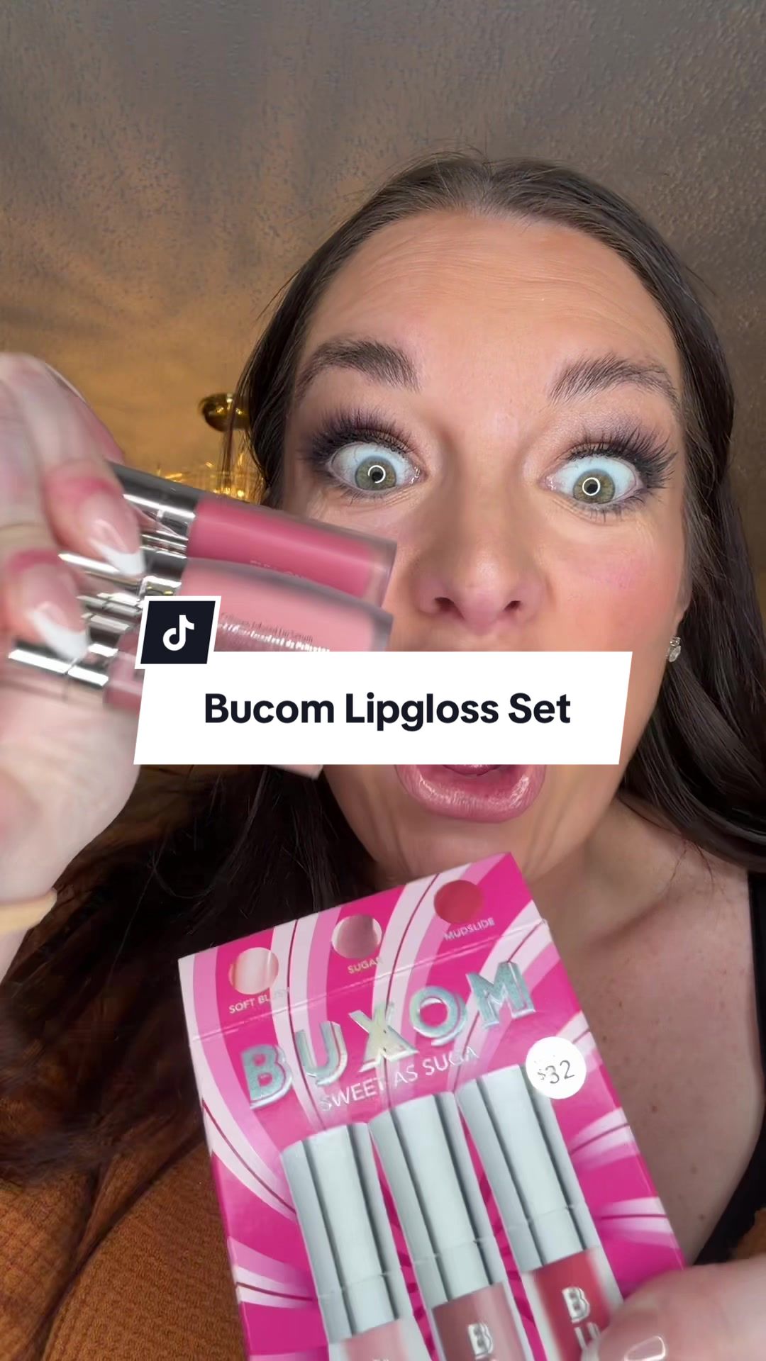 TikTok post by @ambertexasmama for BUXOM Cosmetics. Caption reads: [...] #buxom #buxomlipgloss #lipgloss....