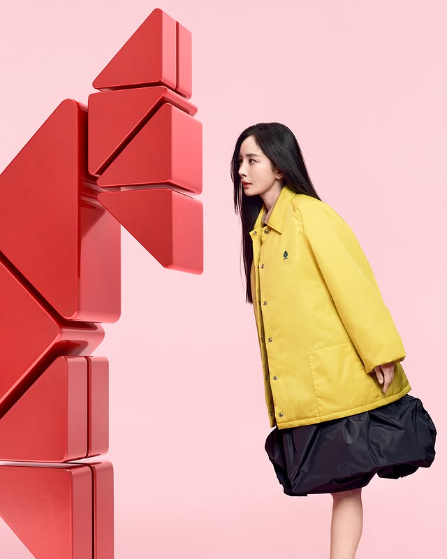 Instagram post by @yangmimimi912 for Prada. Caption reads: The Prada Triangle Fire Horse marks a rare return.....