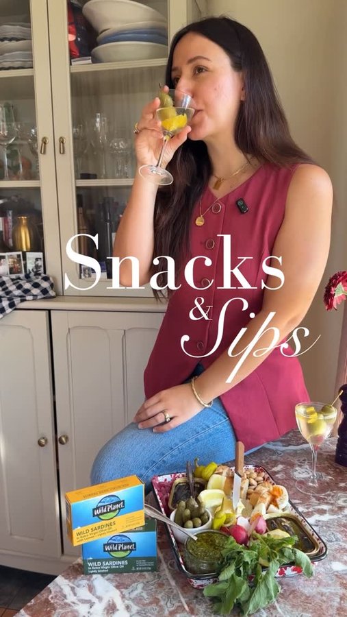 Instagram post by @saturdaytable for Wild Planet Foods. Caption reads: Snacks & Sips, Episode 6: A gorg, bountiful tinned....