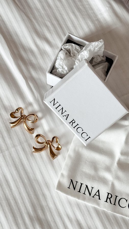 Instagram post by @gabrielachaveza_ for NINA RICCI. Caption reads: OOTD day 1, Rio de Janeiro.
@ninaricci....