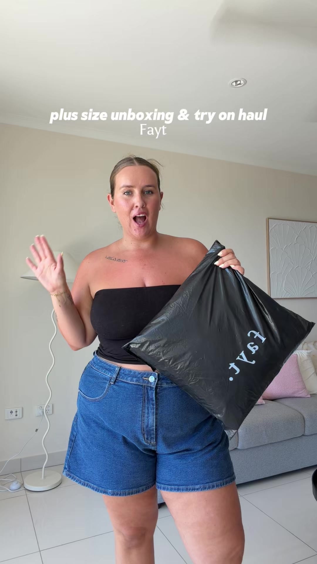 TikTok post by @stephaniemahyy for FAYT The Label. Caption reads: Plus size/curve unboxing and try on with....