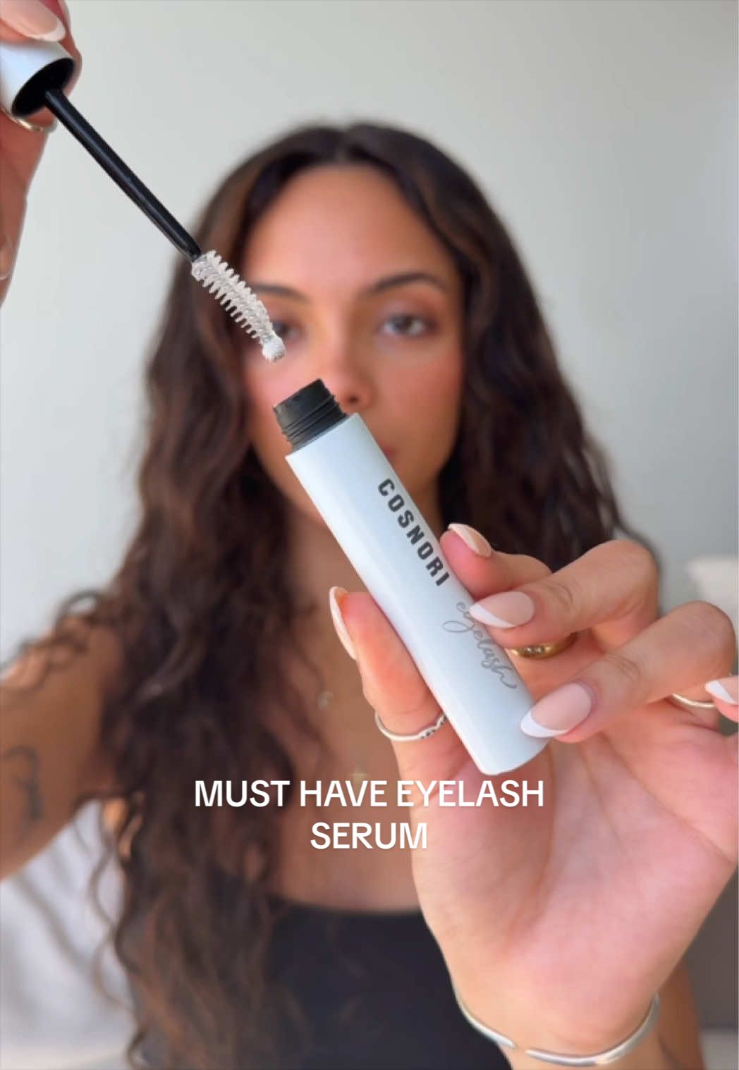 TikTok post by @ayeeeitscam for Cosnori Kazakhstan. Caption reads: how i keep my lashes healthy ESPECIALLY while....