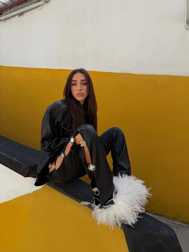 Instagram post by @ginevramavilla for UGG. Caption reads: a feather a day 🪽 // @blumarine @uggineurope AD.