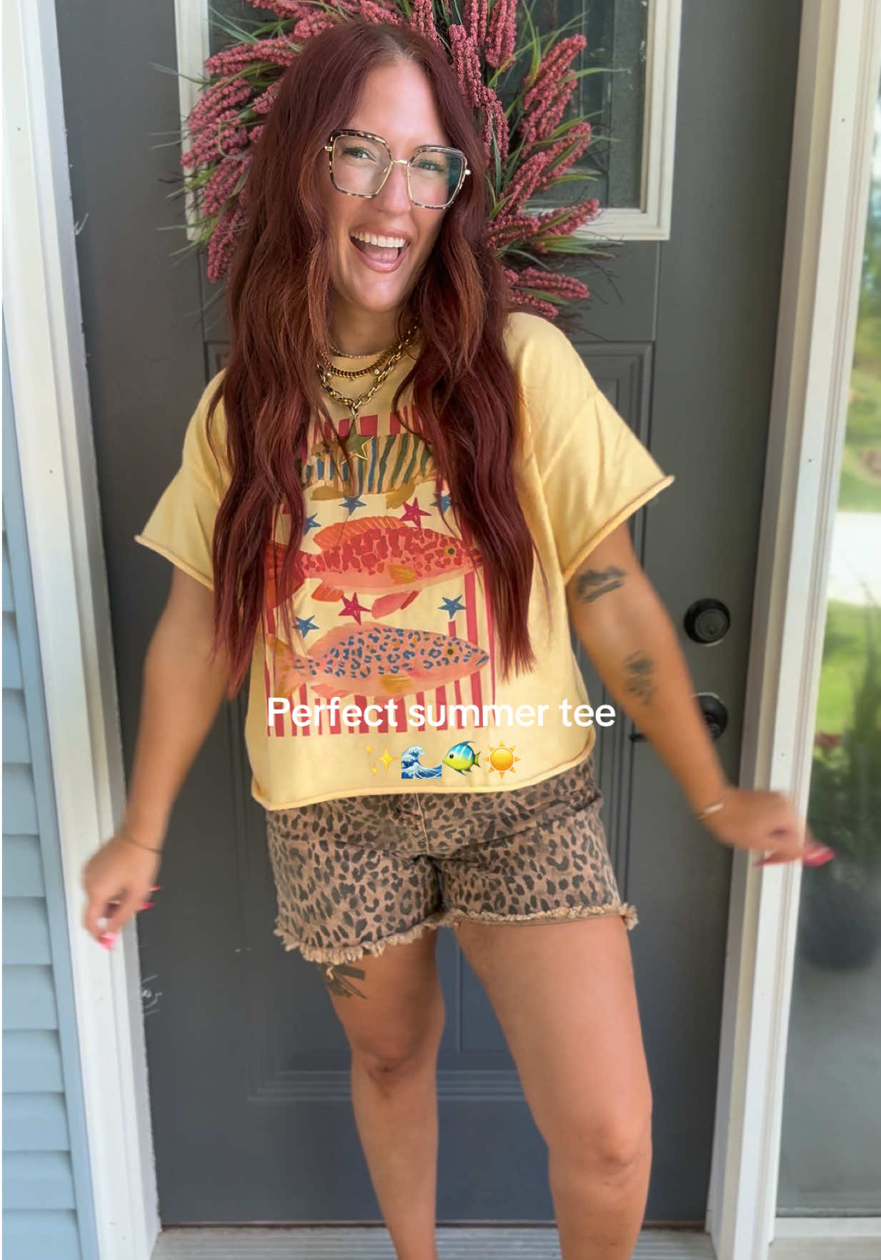 TikTok post by an influencer for Attached.. Caption reads: @Attached. The cutest tee 🤭😍🐠 [...].