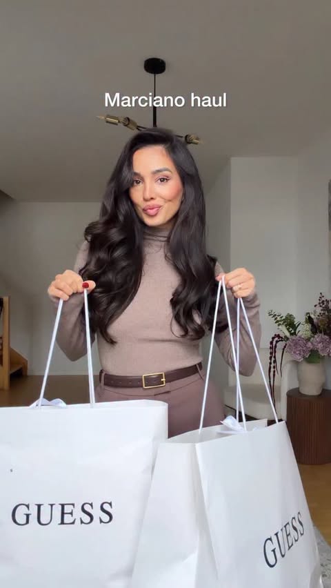 Instagram post by @samira.sfiii for GUESS. Caption reads: Anzeige/ 1 Color- 2 moods🖤✨ which one is your....