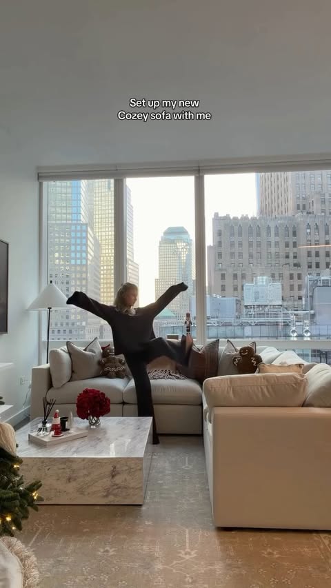 Instagram post by @acquired.style for Cozey. Caption reads: Obsessed with my new @cozey sofa - it completely....