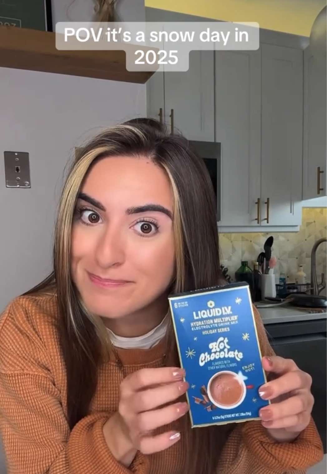 TikTok post by @acooz31 for Liquid IV. Caption reads: Alright so mom might’ve been right about winter....