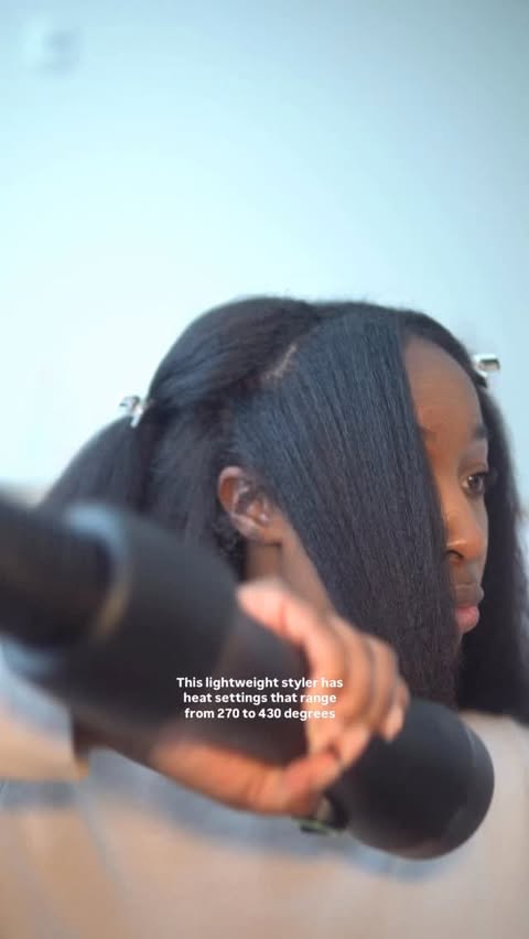 Instagram post by @deairalashante for RevAir. Caption reads: [...] way to easily dry and smooth my hair is....