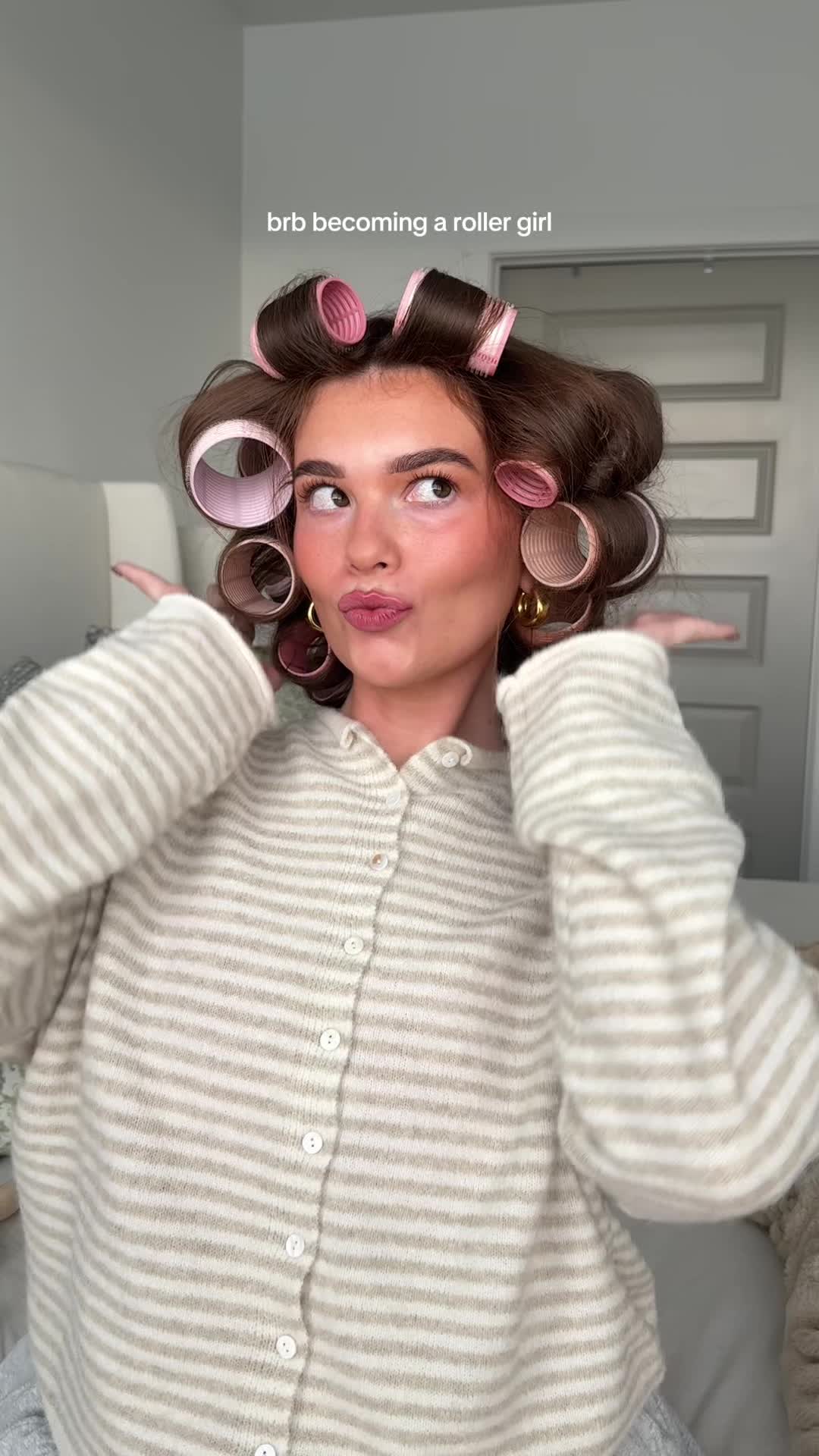 TikTok post by @leslieecatherine for The Hair Edit. Caption reads: [...] becoming a big fan of hair rollers!! @The....
