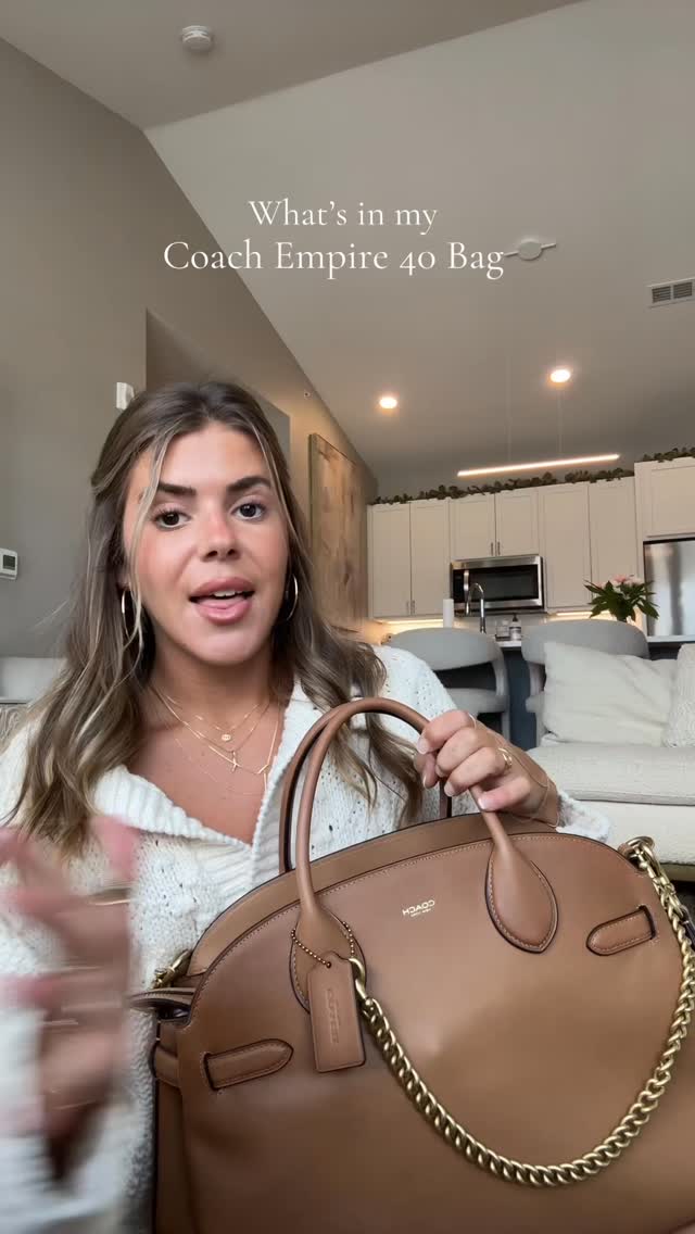 Instagram post by @madisonsvetz for Coach. Caption reads: My Coach Empire 40!!! 💼🫶🏽✨

#coachny #ad @coach....
