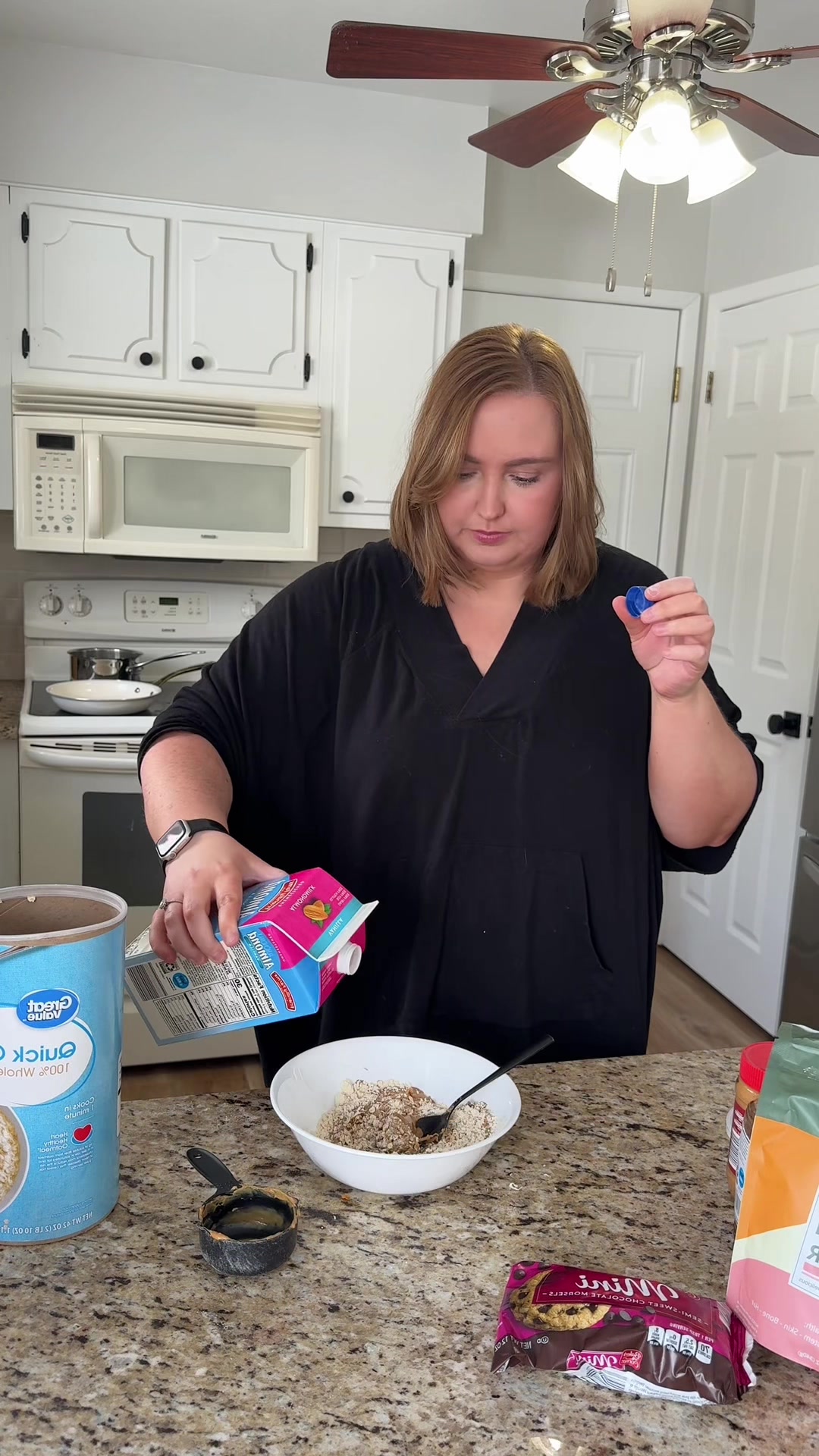 TikTok post by @catebcate29 for Wellious. Caption reads: [...] 1/2 cup of quick oats 1 scoop of @Wellious....