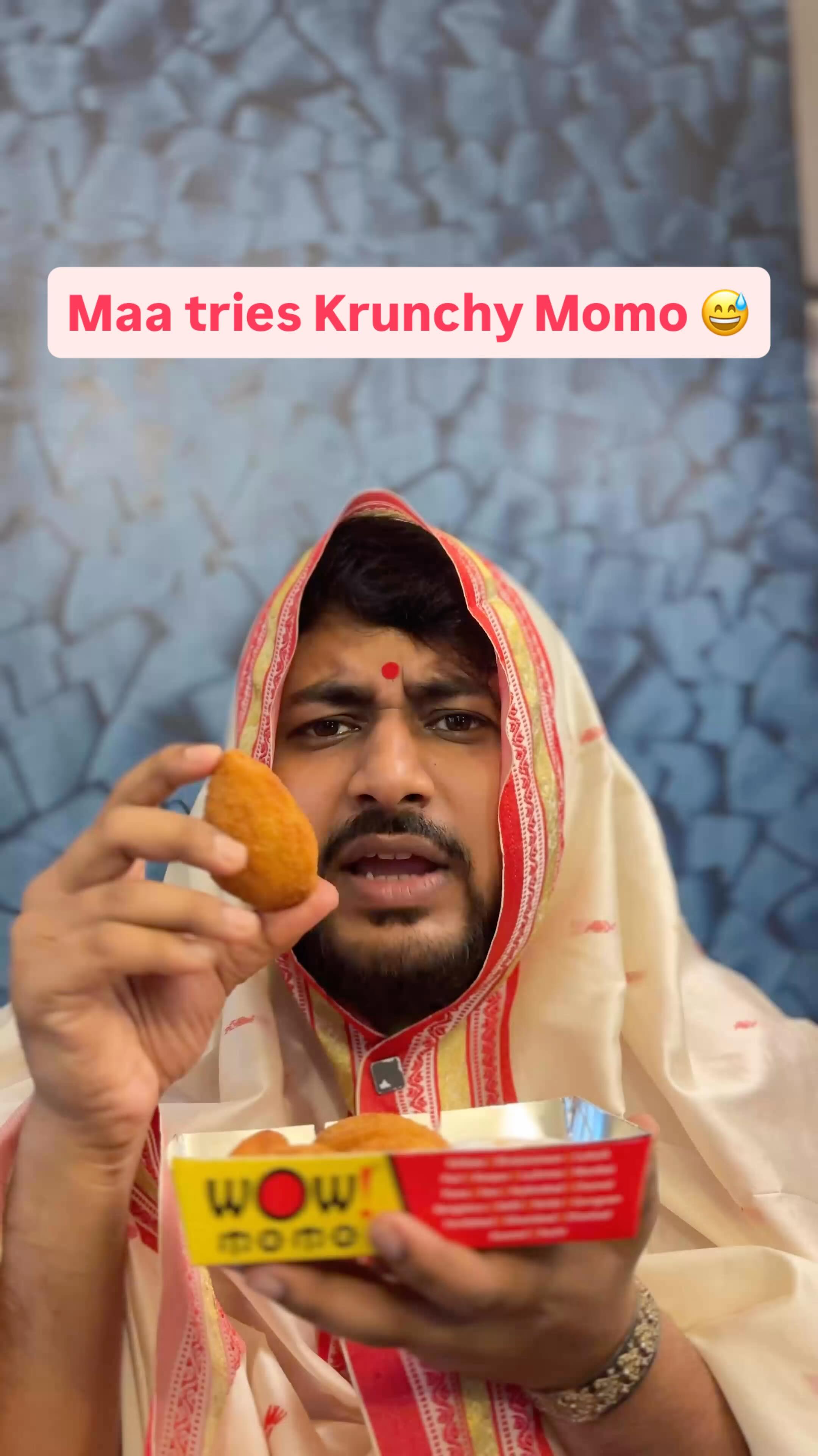 Instagram post by @unmesh_ganguly for Wow! Momo. Caption reads: [...] this momo? 🫠 #Krunchymomo #Durgapujo....