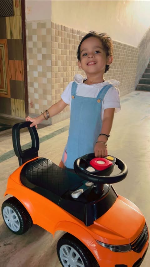Instagram post by @adhisha_tiwari_official for LuvLap. Caption reads: Little rider, big adventures! ⭐🚗 Luvlap Star....