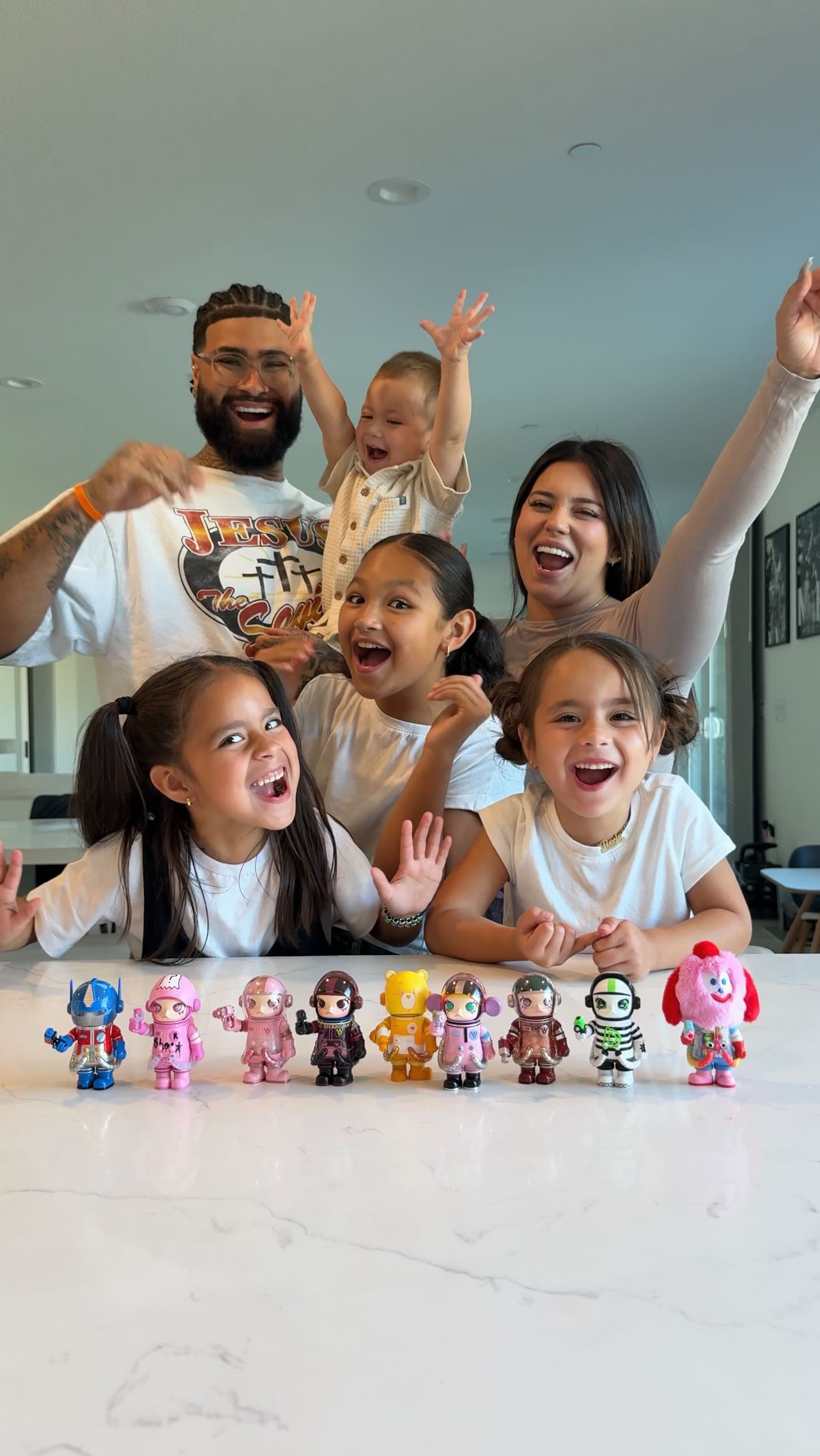 Instagram post by @ronniebanks for POP MART. Caption reads: The whole family is obsessed😍 Head to POP MART US....