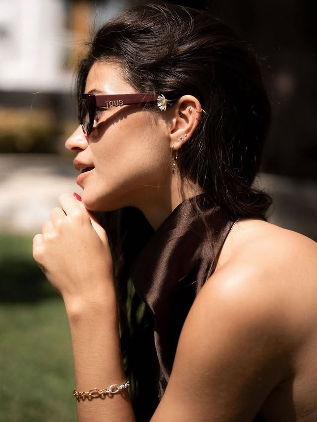 Instagram post by @luisinhaoliveira99 for TOUS. Caption reads: A sunny lunch break hits different 🌞 @tousjewelry....