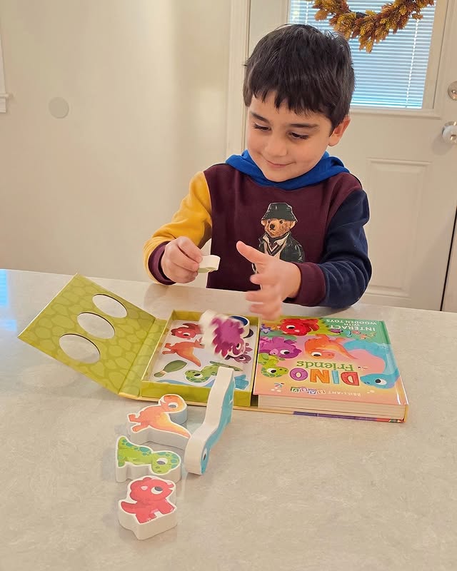 Instagram post by @julianandluca for Little Hippo Books. Caption reads: [...] and interactive books from @littlehippobooks....