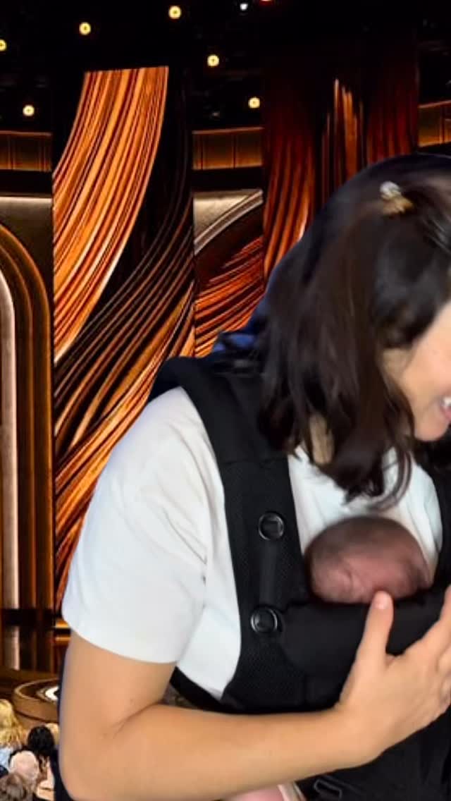 Instagram post by @allimhurley for Ergobaby. Caption reads: she humbly accepts🏆

#parenting #oscars #award....