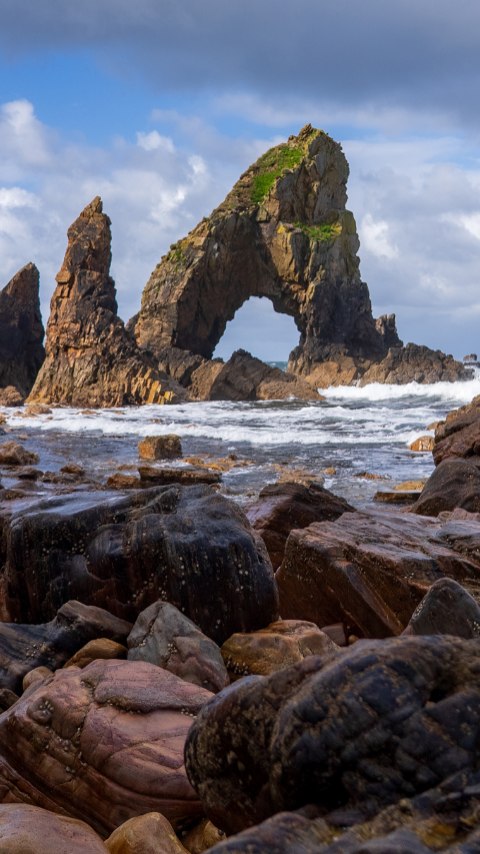 Instagram post by @paperboyo for Discover Northern Ireland. Caption reads: ad| Two coastlines, one epic road trip. Pair....
