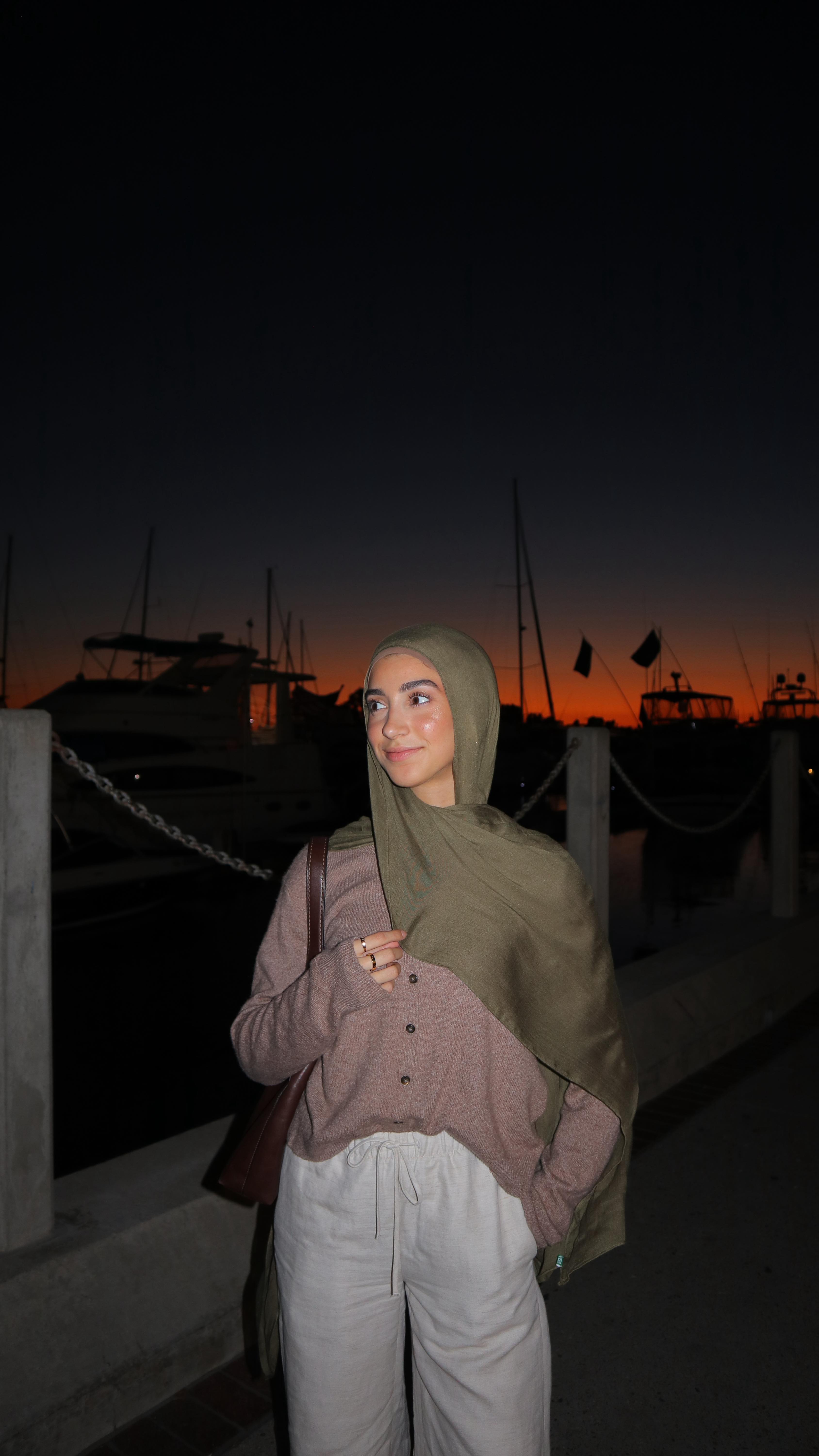 Instagram post by @norhanajaj for Veiled. Caption reads: Fall vibes are coming in @veiledcollection 🍂🤍....