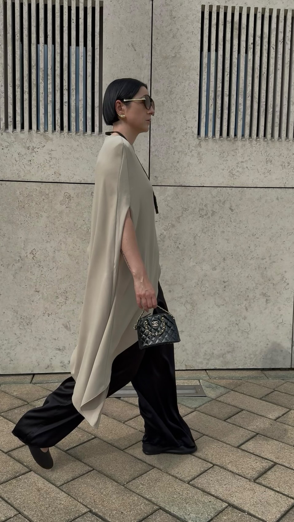 Instagram post by @fashionstylistmb for Source Unknown. Caption reads: ad/werbung soft satin silk @sourceunknown_official....