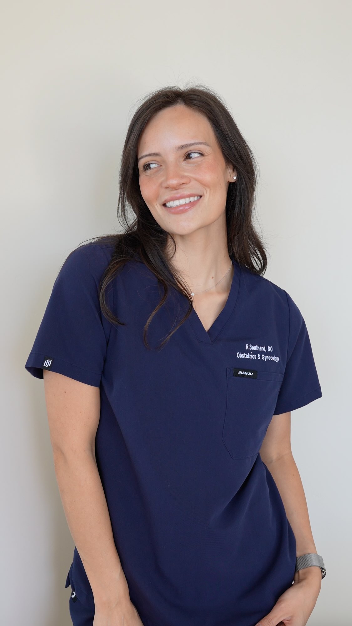 Instagram post by @rachelsouthard for Jaanuu. Caption reads: My go-to scrub color? Midnight Navy from @jaanuu.....