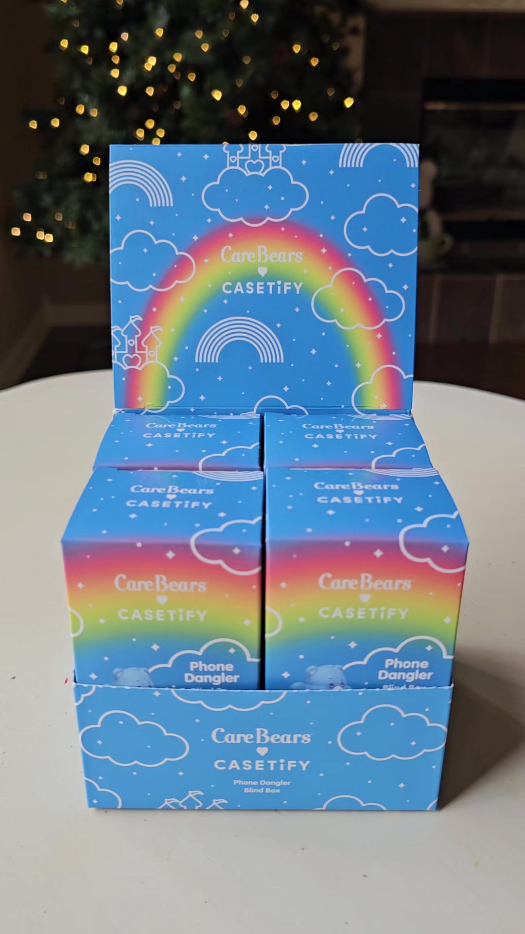 TikTok post by @kira.kabuki for CASETiFY. Caption reads: Which Care Bear dangler would you add to your....