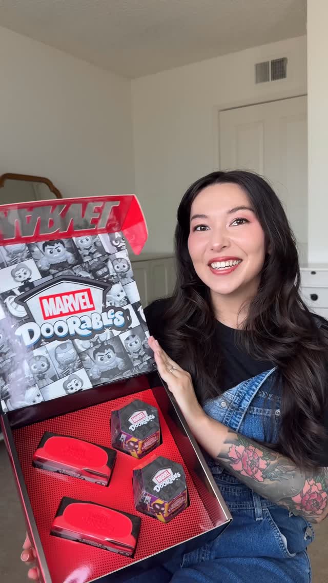 Instagram post by @traciemegumi for Disney Doorables. Caption reads: Unboxing NEW Marvel doorables from....
