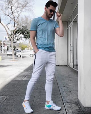 Instagram post by @masonallred for Ford Models. Caption reads: Sometimes I throw on some color 🌸 how fun are....