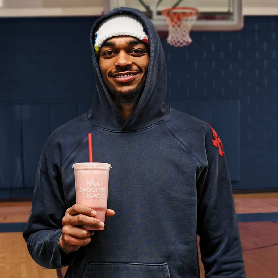 Instagram post by @pjwashington for Smoothie King. Caption reads: From the court to the gym, the whey protein in....