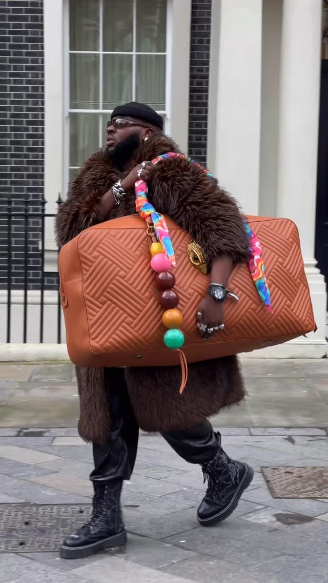 Instagram post by @david_fadd for Kurt Geiger. Caption reads: Packing light? Never heard of her 🤭

#KurtGeiger.