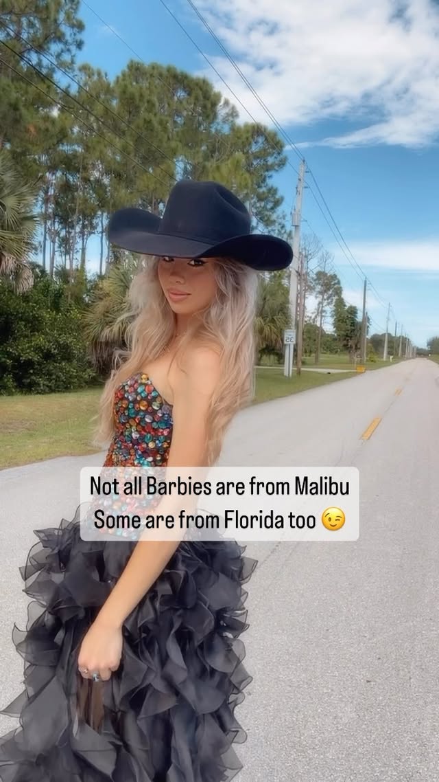 Instagram post by @shelbi_leeann_xo for Sherri Hill. Caption reads: I heard Floridians are cute 🤷‍♀️ #reelsvideo....