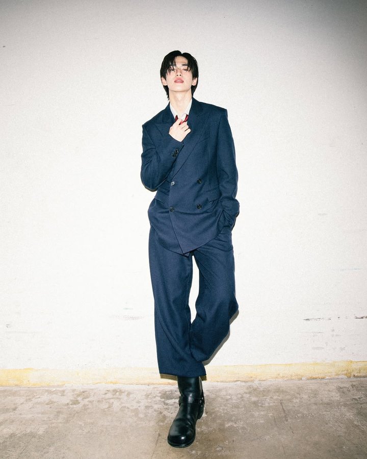 Instagram post by @jinwook.busofficial for LOEWE. Caption reads: ขออนุญาตนะมัมหมี

#LOEWE....