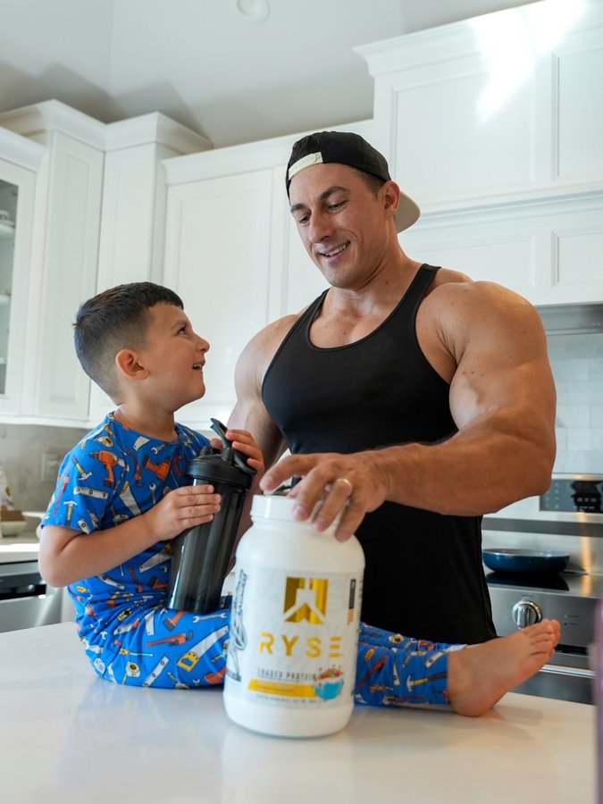 Instagram post by @sadikhadzovic for RYSE Supps. Caption reads: Thank you, @RYSE. They have a dozen protein....