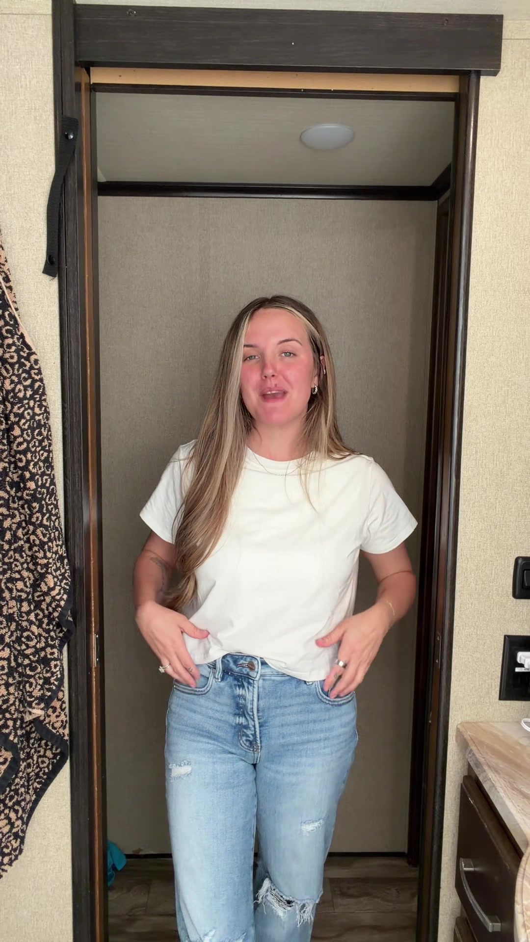 TikTok post by @sydneyepage for Klassy Network. Caption reads: [...] needs a staple white tee from @Klassy....