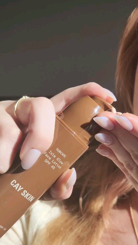 Instagram post by @juliagrusz for Cay Skin. Caption reads: @cayskin 🤎 Remember winter weather still [...].