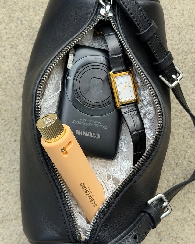 Instagram post by @lucyxlopez for Scentbird. Caption reads: Current rotation: coffee, vibes, and Scentbird....