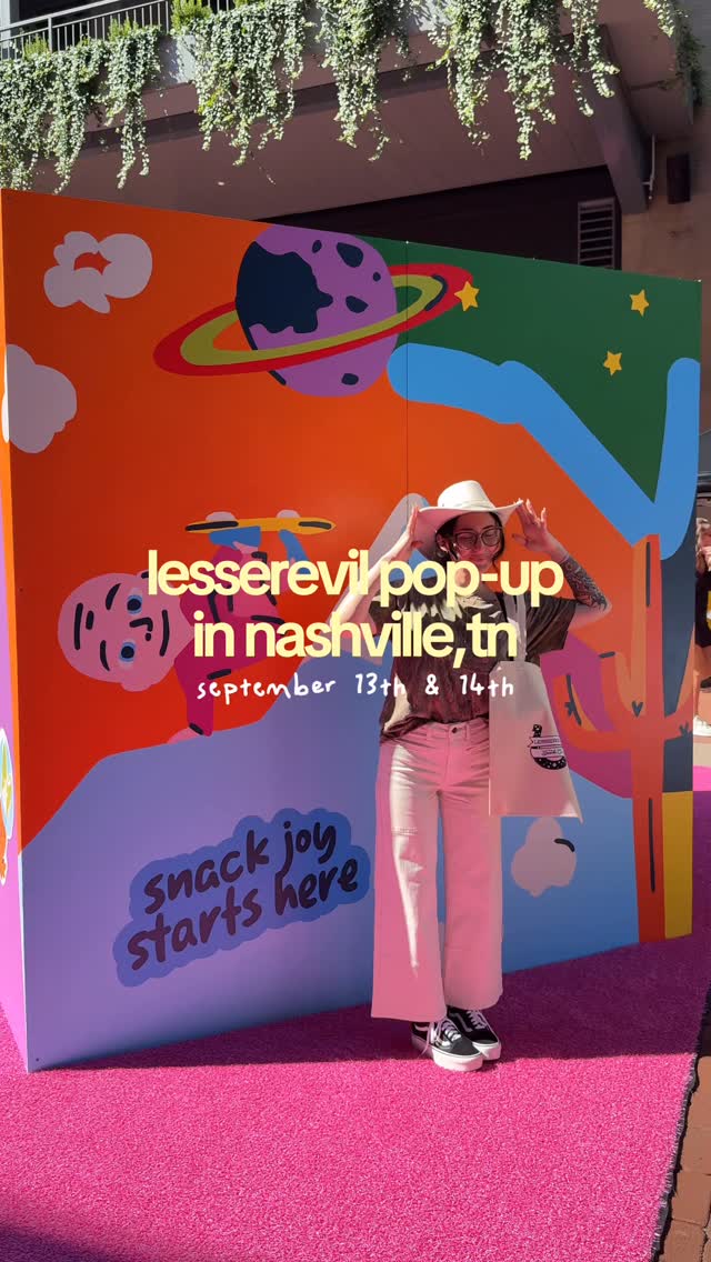 Instagram post by @nashvillewithcaitlin for LesserEvil Kids. Caption reads: ✨NASHVILLE!!✨ The @lesserevilsnacks pop-up is at....