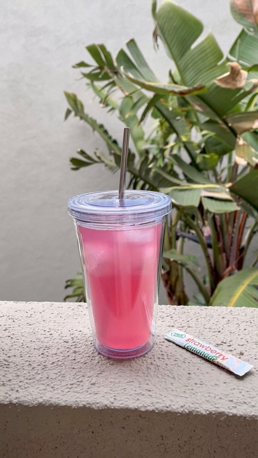 Instagram post by @ashley_kuczenski for True Lemon. Caption reads: Happily hydrated with @truelemon 🍋 Use code....