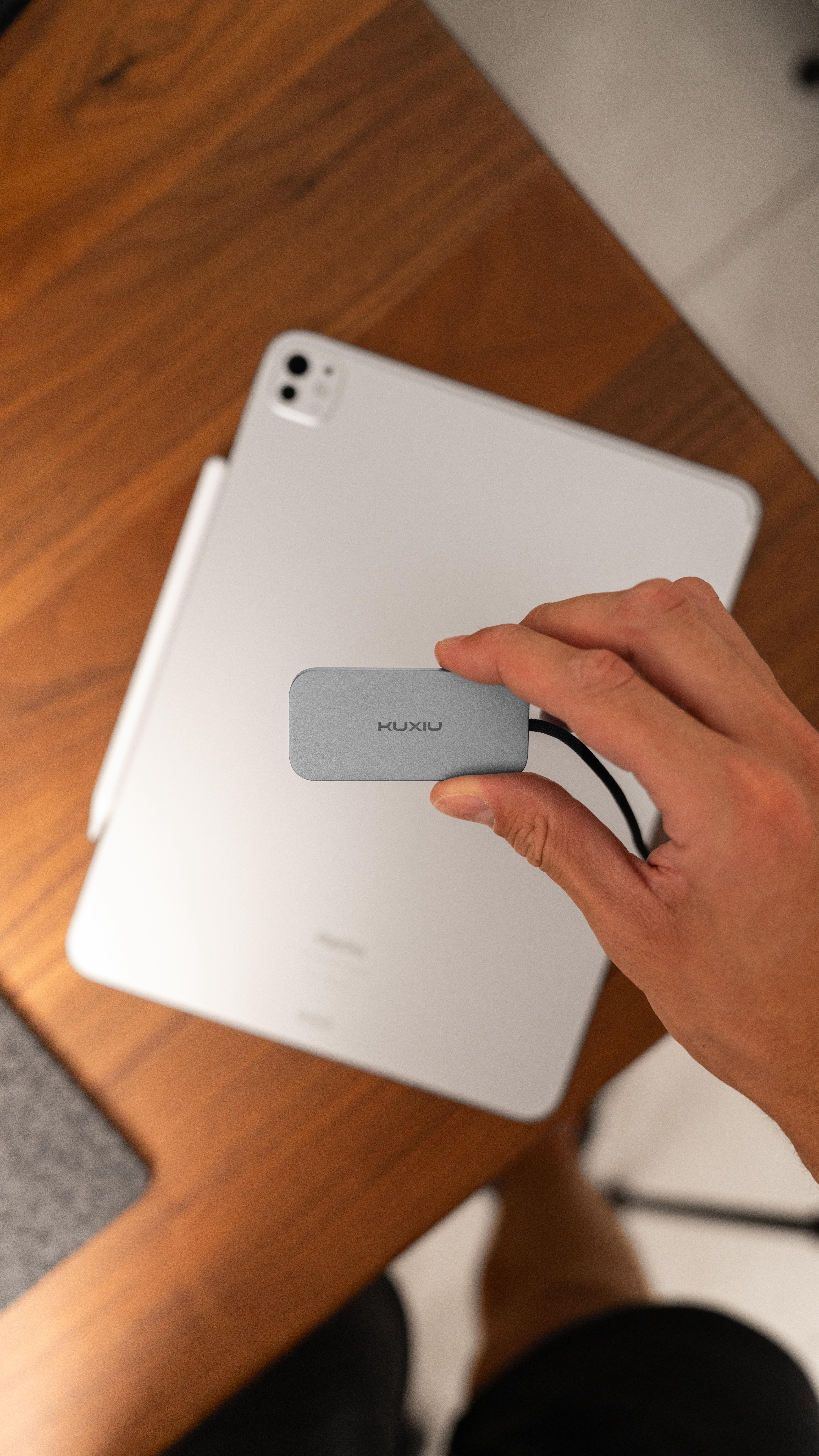 Instagram post by @edc_tech_ for KUXIU. Caption reads: Meet the all new @kuxiutech M30, the charger that....