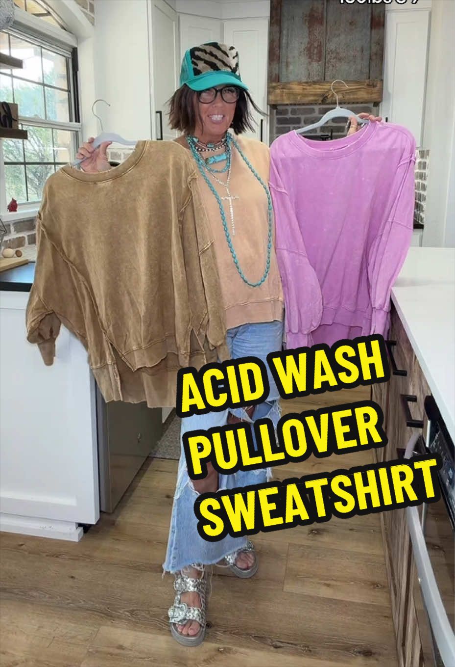 TikTok post by @twoboymom3 for Madison + Mallory. Caption reads: AUGUST GLOW ACID WASH PULLOVER SWEATSHIRT FROM....